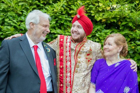 Groom and his parents - VKP Photography